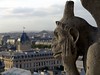 Les Gargouilles : What do you see when you look up to the top of the great cathedral of Notre Dame? You see monsters, half-man and half-beast. These demon looking creatures carved out of stone are called gargoyles. They are one of the many eerie stone figures that adorn the gutters of the Cathedral of Notre Dame in Paris. Gargoyle comes from a Latin word, meaning gullet or drain. That's what the strange looking creatures are, they're drainpipes. Each grotesque figure has a passageway inside that carries rainwater from the roof and out through the gargoyle. From the top of the cathedral's towers the gargoyles have a magnificent view of the city.

*********** color photos are also available for purchase in black & white  **************